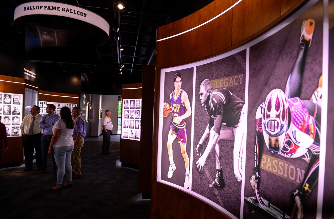 (Leah Hogsten  |  The Salt Lake Tribune)  Visitors to the Utah Sports Hall of Fame tour the displays, Wednesday, May 15, 2019 before its grand opening this Saturday.