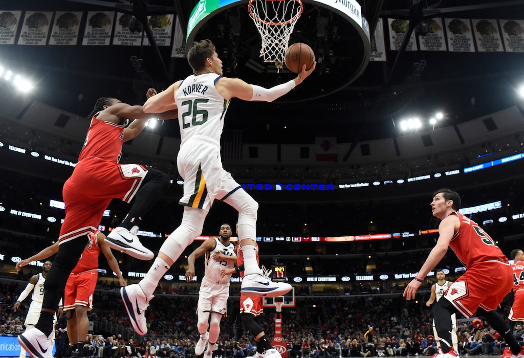 Utah Jazz guard Kyle Korver (26) goes to the basket as Chicago Bulls guard Brandon Sampson, left, defends during the second half of an NBA basketball game Saturday, March 23, 2019, in Chicago. The Jazz won 114-83. (AP Photo/David Banks)