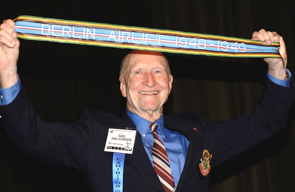 (U.S. Air Force photo)  Retired Col. Gail Halvorsen displays the newly authorized Berlin Airlift streamer presented to him at the Airlift Tanker Association convention in 2005. Funeral services for the Berlin Candy Bomber were held Tuesday, Feb. 23, 2022, in Provo.