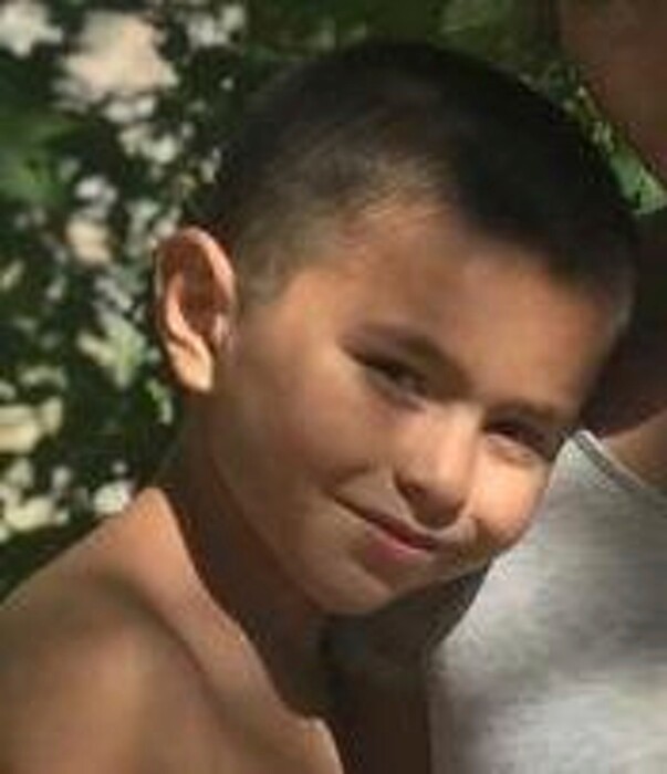 This undated photo released by the Phoenix Police Department on Saturday, Sept. 1, 2018 shows missing child Victor Nunez-Coronado, 8 years old, 4' tall, 60 pounds, with black hair and brown eyes. An Amber Alert has been issued for Victor and his brother, Jonathan, and their father, Dimas Coronado, missing since the boys' mother and a male housemate were found fatally shot in the Phoenix home where police said the victims and boys lived. (Phoenix Police Department via AP)