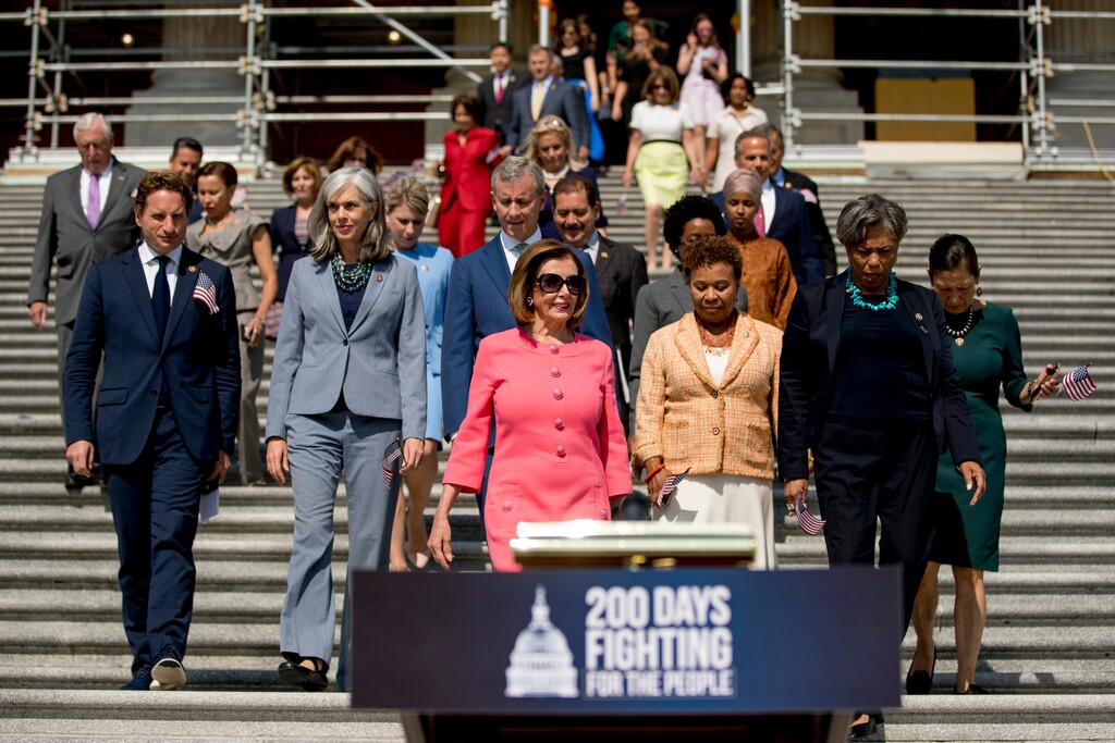 (Andrew Harnik | AP file photo) House Speaker Nancy Pelosi of Calif., and House Democrats arrive for a news conference on the first 200 days of the 116th Congress at the House East Front steps of the Capitol in Washington on July 25, 2019. Nearly half the House Democrats now support an impeachment inquiry of President Donald Trump in the aftermath of Robert Mueller’s testimony to Congress.