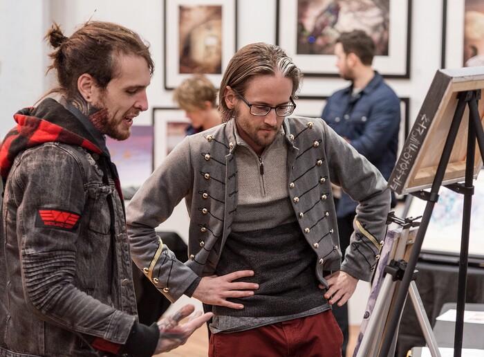 (Michael Mangum  |  Special to the Tribune) Connect founder and director Michael Christensen, right,  listens as artist Joe Drury discusses one of Drury's pieces with him at an art exhibition at the Urban Arts Gallery in Salt Lake City, UT on Friday, November 8th, 2019.