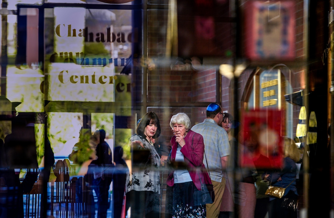 (Leah Hogsten | The Salt Lake Tribune) Sharonne Zippel talks with Pamela Atkinson prior to a Shabbat candle lighting at the Chabad Lubavitch of Utah in 2019.