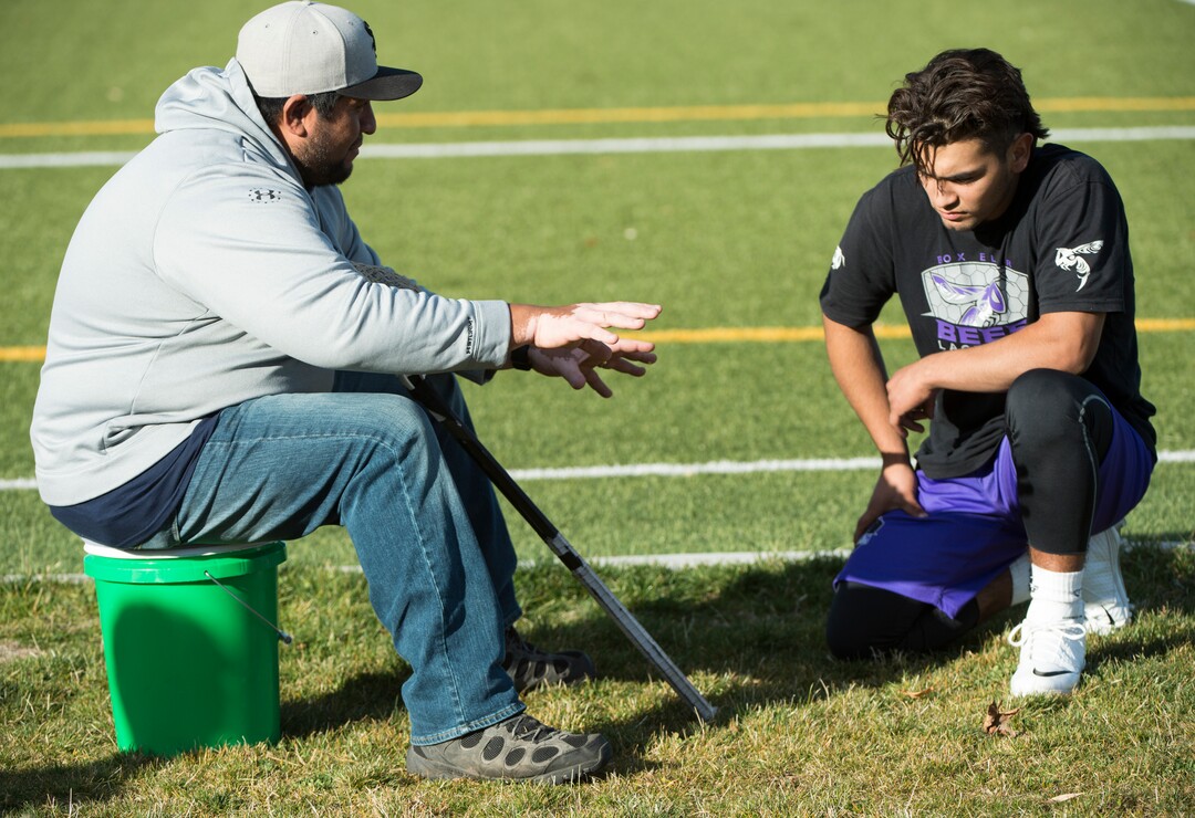 (Rick Egan | The Salt Lake Tribune) Brandyn Gaytan listens to his dad, Box Elder lacrosse coach Juan Gaytan, between games during a tournament in Logan on Saturday, Nov. 3, 2018.