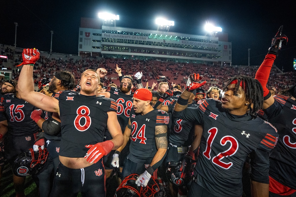 (Rick Egan | The Salt Lake Tribune) Utah linebacker Lander Barton (8) and wide receiver Larry Simmons (12)celebrate the Utes' win.