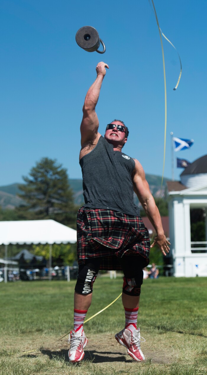 (Rick Egan  |  The Salt Lake Tribune)      Jason Knighton of West Jordon,  competes in the "Weight Over Bar" competition at the 44th annual Utah Scottish Festival and Highland Games at the Utah State Fairgrounds, Sunday, June 10, 2018.