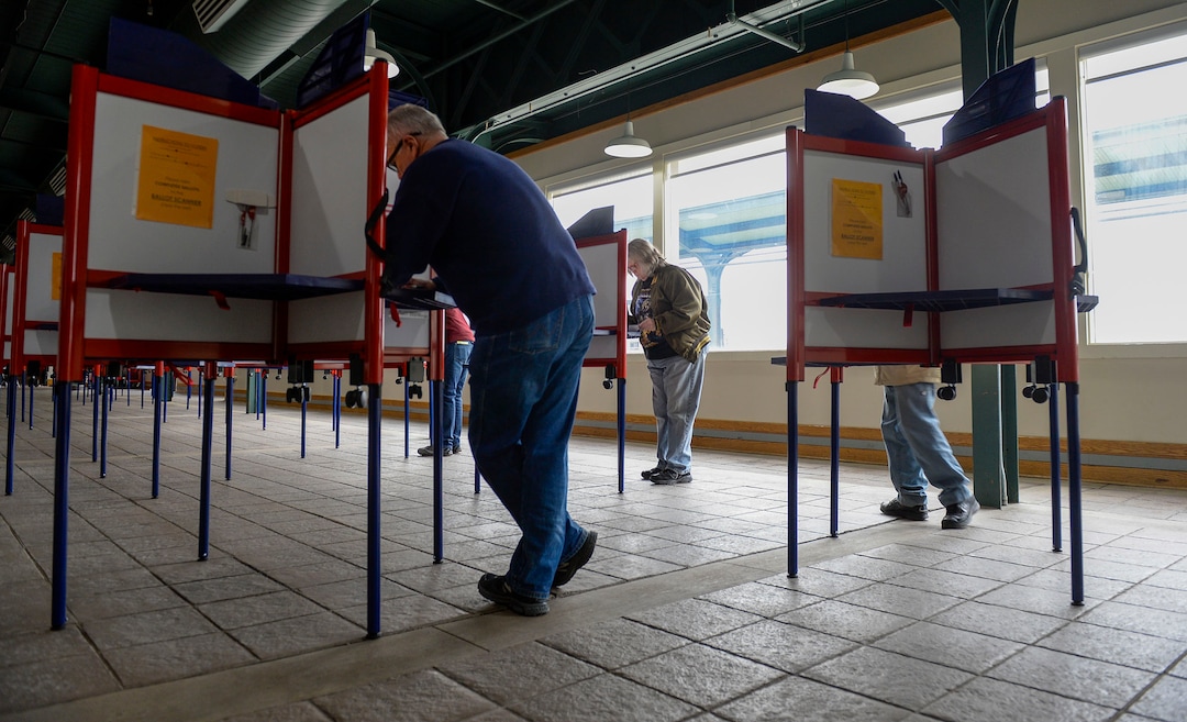 (Leah Hogsten  |  The Salt Lake Tribune) Voters cast their ballots at Ogden's Union Station during Utah's Super Tuesday primary, Mar. 3, 2020,