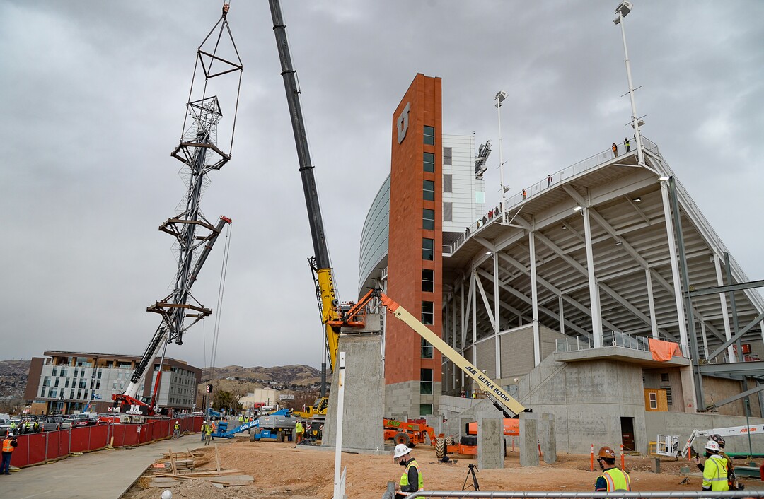 (Francisco Kjolseth  |  The Salt Lake Tribune) The Olympic cauldron is returned to the University of Utah on Friday, Jan. 29, 2021, after a refurbishment to lengthen its life span. Removed in February 2020, the cauldron was transported to an off-site location, where all 738 glass panes were removed and the complete structure was sandblasted and refinished. The refurbished structure was placed on a newly constructed, 17-foot-tall pedestal, just north of the stadium ticket office, with plans to add high-quality glass.