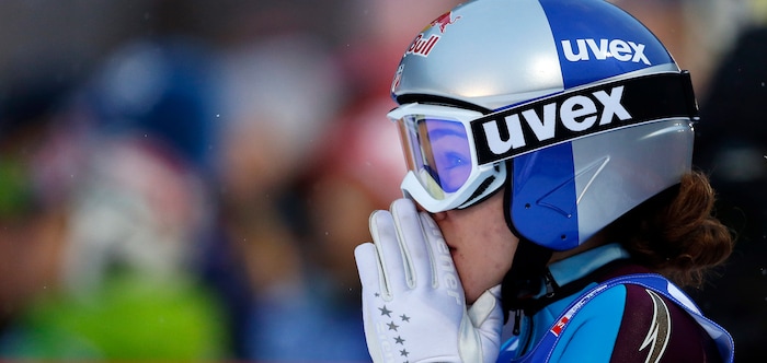 Sarah Hendrickson of the United States awaits the results on a screen after her second jump to win the women's ski jumping HS 106 Individual of the Nordic Ski World Championships in Val di Fiemme, Italy, Friday, Feb. 22, 2013.  (AP Photo/Matthias Schrader)