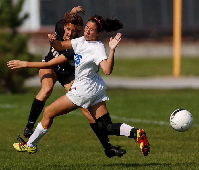 (Trent Nelson  |  Tribune File Photo)  Viewmont's Ella Johnson and Taylorsville's Natasha Howard in action as Viewmont defeats Taylorsville High School 2-1, girls soccer, in Taylorsville, Utah, Thursday, September 20, 2012.