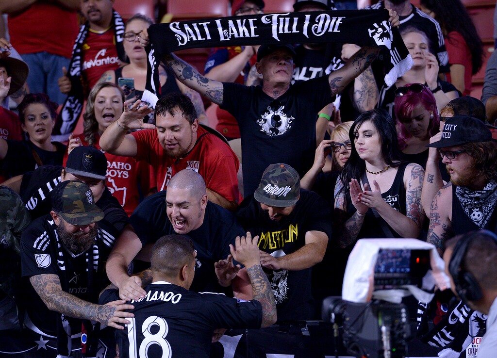 (Leah Hogsten | The Salt Lake Tribune) Real Salt Lake fans celebrate the Rocky Mountain Cup win with Real Salt Lake goalkeeper Nick Rimando (18). Real Salt Lake defeated the Colorado Rapids 4-1 for the Rocky Mountain Cup at Rio Tinto Stadium, Saturday, August 26, 2017.