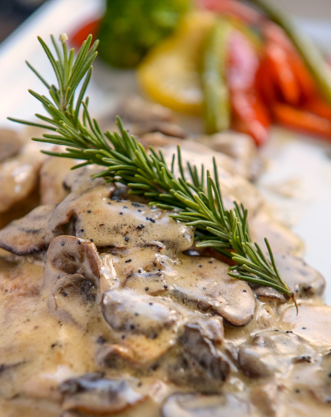(Leah Hogsten  |  The Salt Lake Tribune) Scaloppine al Funghi with veal cutlets and mushroom cream sauce, $18 at Osteria Amore, serving traditional flavors of Italy with a modern spin, Jan. 10, 2020.