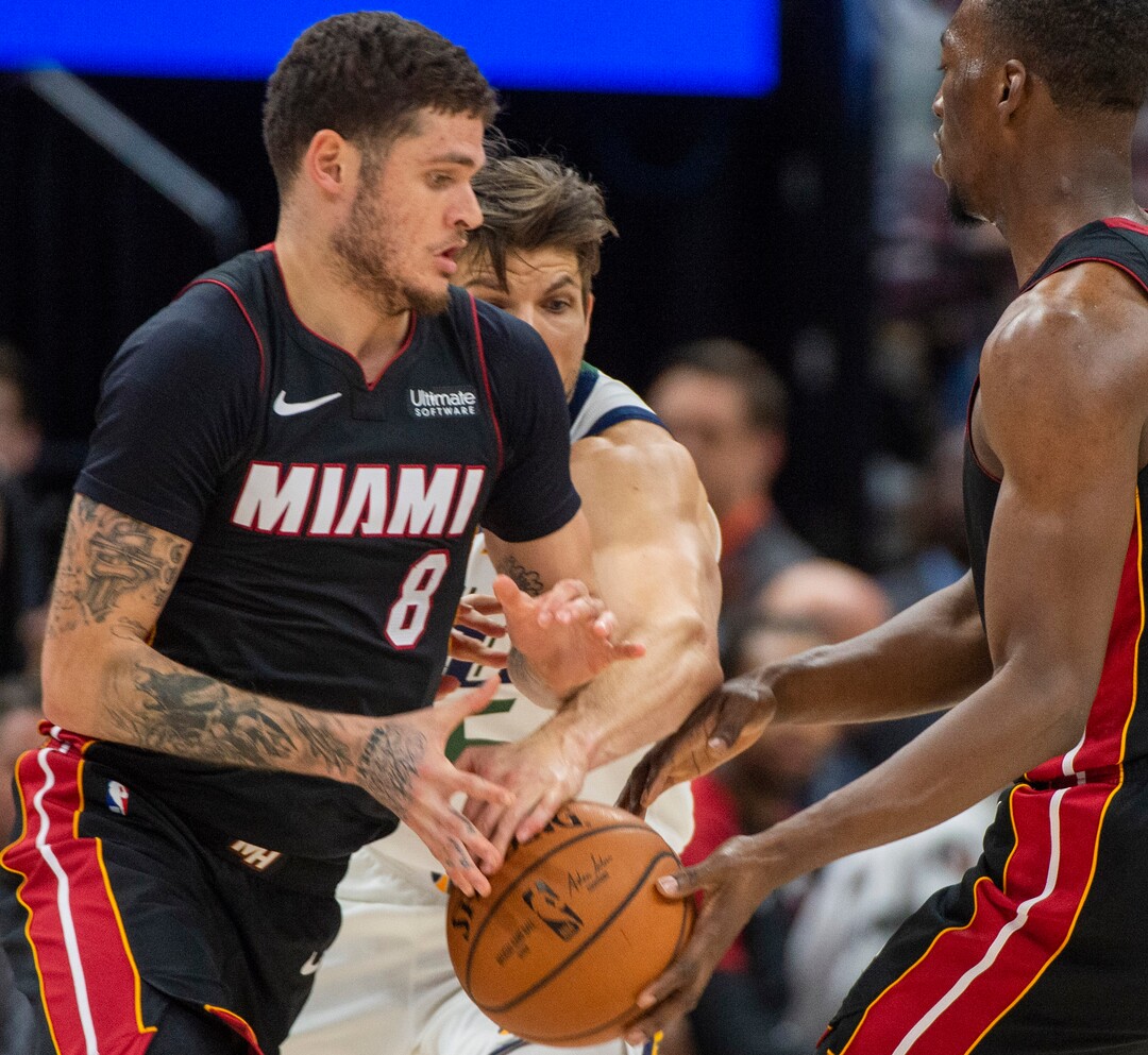 (Rick Egan  |  The Salt Lake Tribune)     Utah Jazz guard Kyle Korver (26) gets his hand on the ball, as Miami Heat guard Tyler Johnson (8) hands the ball off to Miami Heat center Bam Adebayo (13), in NBA action between Utah Jazz and Miami Heat, at Vivint Smart Home Arena Wednesday, Dec. 12, 2018.