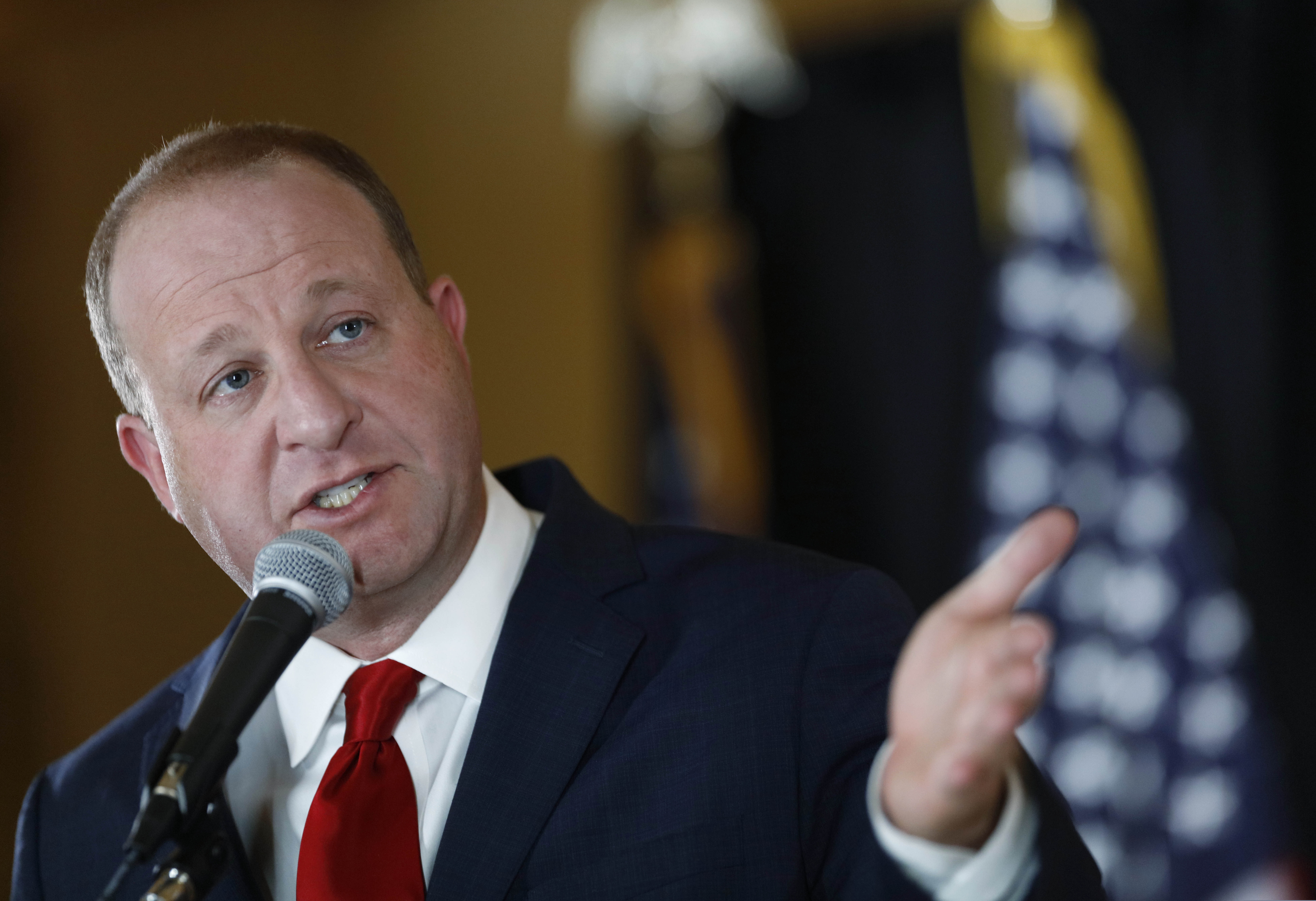 (AP Photo/David Zalubowski)
Colorado Gov. Jared Polis makes a point during a news conference, May 11, in Denver.