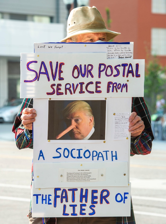 (Rick Egan  |  The Salt Lake Tribune)    Rod Miller joins protesters during a rally to "Save the Post Office," hosted by Alliance for a Better Utah, NAACP Salt Lake Branch, League of Women Voters at the Post Office on 200 South in Salt Lake City, Saturday, Aug. 22, 2020.