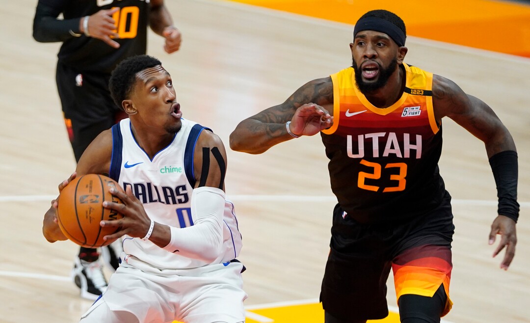 (Rick Egan | The Salt Lake Tribune)  Dallas Mavericks guard Josh Richardson (0) looks for a shot as Utah Jazz forward Royce O'Neale (23) defends, in NBA action between the Utah Jazz and the Dallas Mavericks at Vivint Arena, on Friday, Jan. 29, 2021.