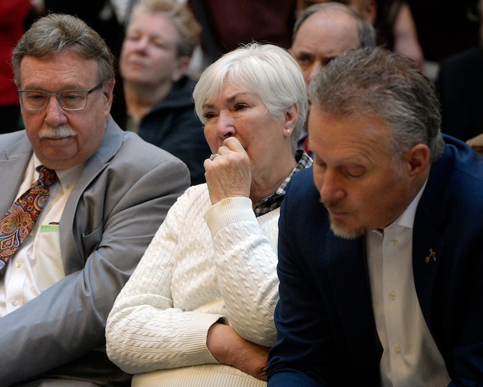 (Al Hartmann  |  The Salt Lake Tribune) 	
Husband Kim Wilson, left, Gail Miller and son Greg Miller well up with emotion as they listen to a talk from Larry Miller's grandson, Zane Miller about his grandfathers struggle with diabetes near the end of his life. The Millers announced that the University of Utah will receive a $5.3 million gift from Larry H. and Gail Miller Family Foundation to fight diabetes, called "Driving Out Diabetes:  A Larry H. Miller Wellness Initiative."