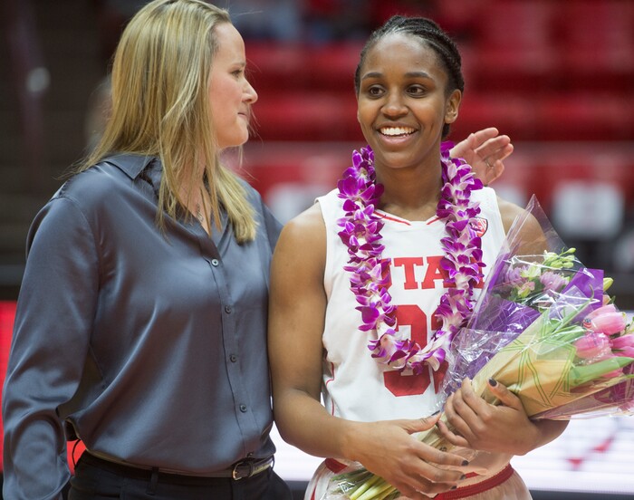 (Rick Egan  |  The Salt Lake Tribune)      Utah Utes forward Tanaeya Boclair (32) gets a hug from Utah Utes head coach Lynne Roberts, as she his honored on senior night, in PAC-12 women's basketball action at the Jon M. Huntsman Center, Sunday, Feb. 18, 2018.