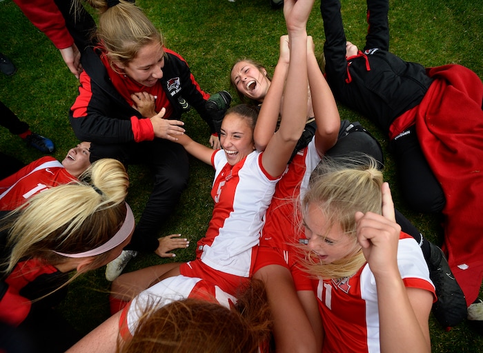 (Scott Sommerdorf   |  The Salt Lake Tribune)   American Fork celebrates after they beat Syracuse 3-1 to win the 6A championship game played at Rio Tinto, Friday, October 20, 2017. 