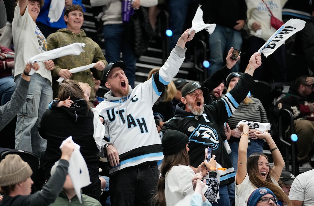 (Francisco Kjolseth | The Salt Lake Tribune) Utah Mammoth fans celebrate during a game at the Delta Center. Excitement — and ticket prices — are high for the team’s first trip to the postseason.