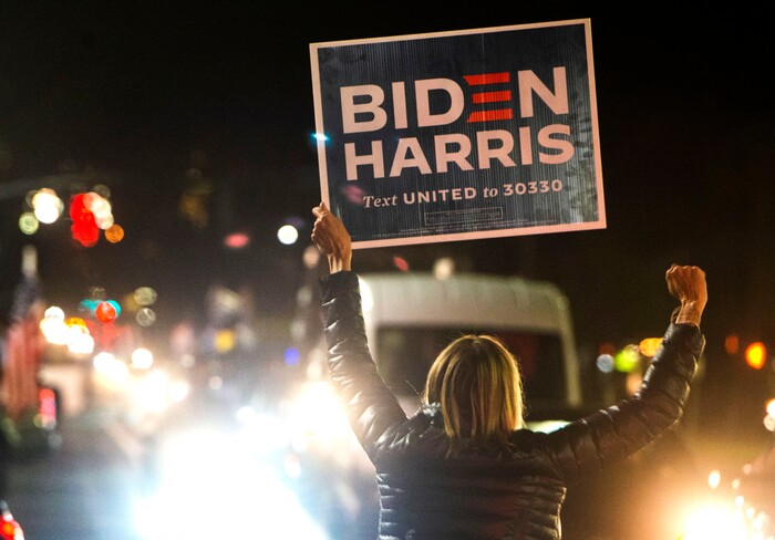 (Rick Egan | The Salt Lake Tribune)  A lone Biden supporter braves the comments from Trump fans during a Trump rally at Washington Square, on Monday, Nov. 2, 2020.
