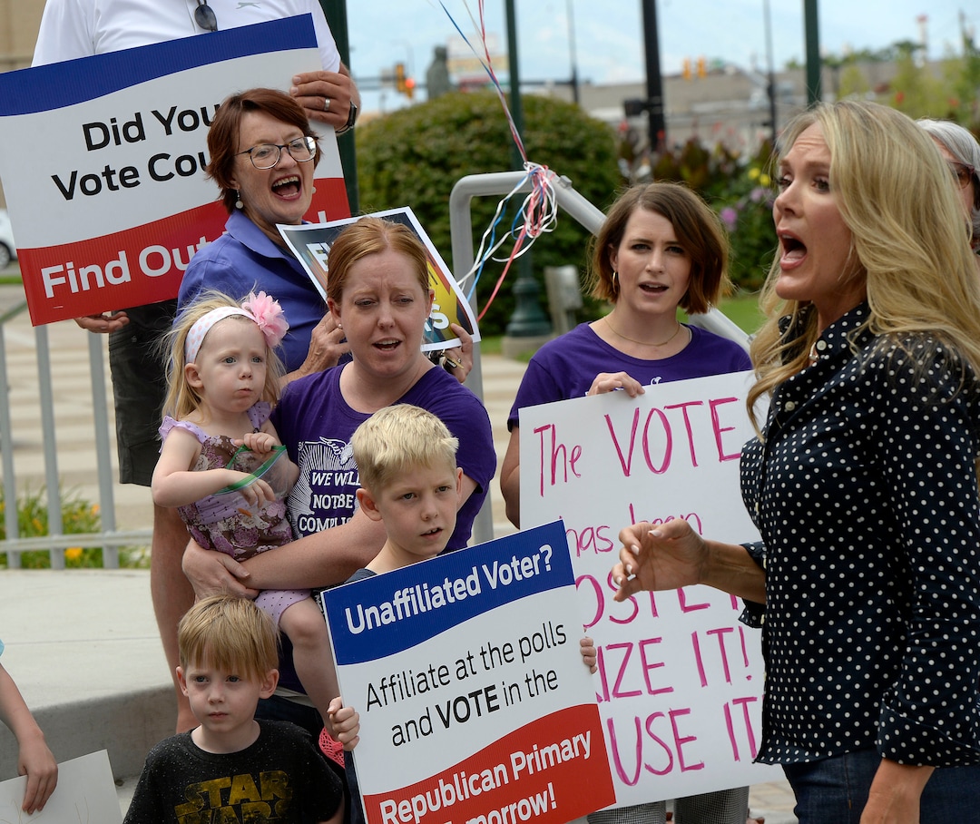 (Al Hartmann  |  The Salt Lake Tribune) Mormon Women for Ethical Government, Salt Lake Indivisible and Action Utah members  rally against the confusing process of special election to fill Chaffetz' 3rd District seat outside the historical courthouse in Provo Monday Aug 14. 