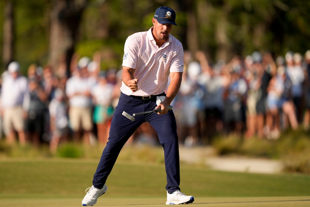 Bryson DeChambeau celebrates after a birdie on the 11th hole during the third round of the U.S. Open golf tournament Saturday, June 15, 2024, in Pinehurst, N.C. (AP Photo/Matt York)