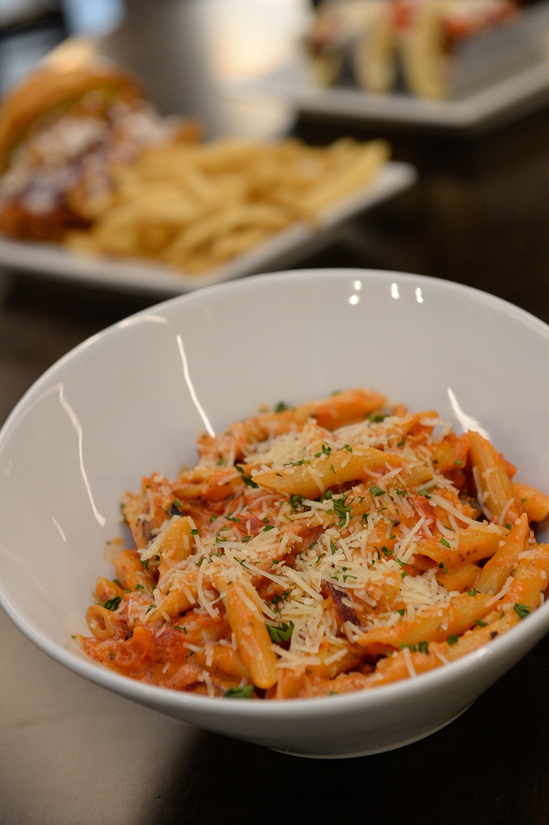 (Francisco Kjolseth  |  The Salt Lake Tribune)  The penne rose' with chicken at the new Pins & Ales 21+ bar which is adjacent to the all ages All Star Bowling which opened a new 70,000 square foot, high-tech bowling and entertainment center at Valley Fair Mall, in West Valley City. It has 32 lanes with luxury seating, laser tag and virtual reality games as well as old-school air hockey, basketball and bumper cars.