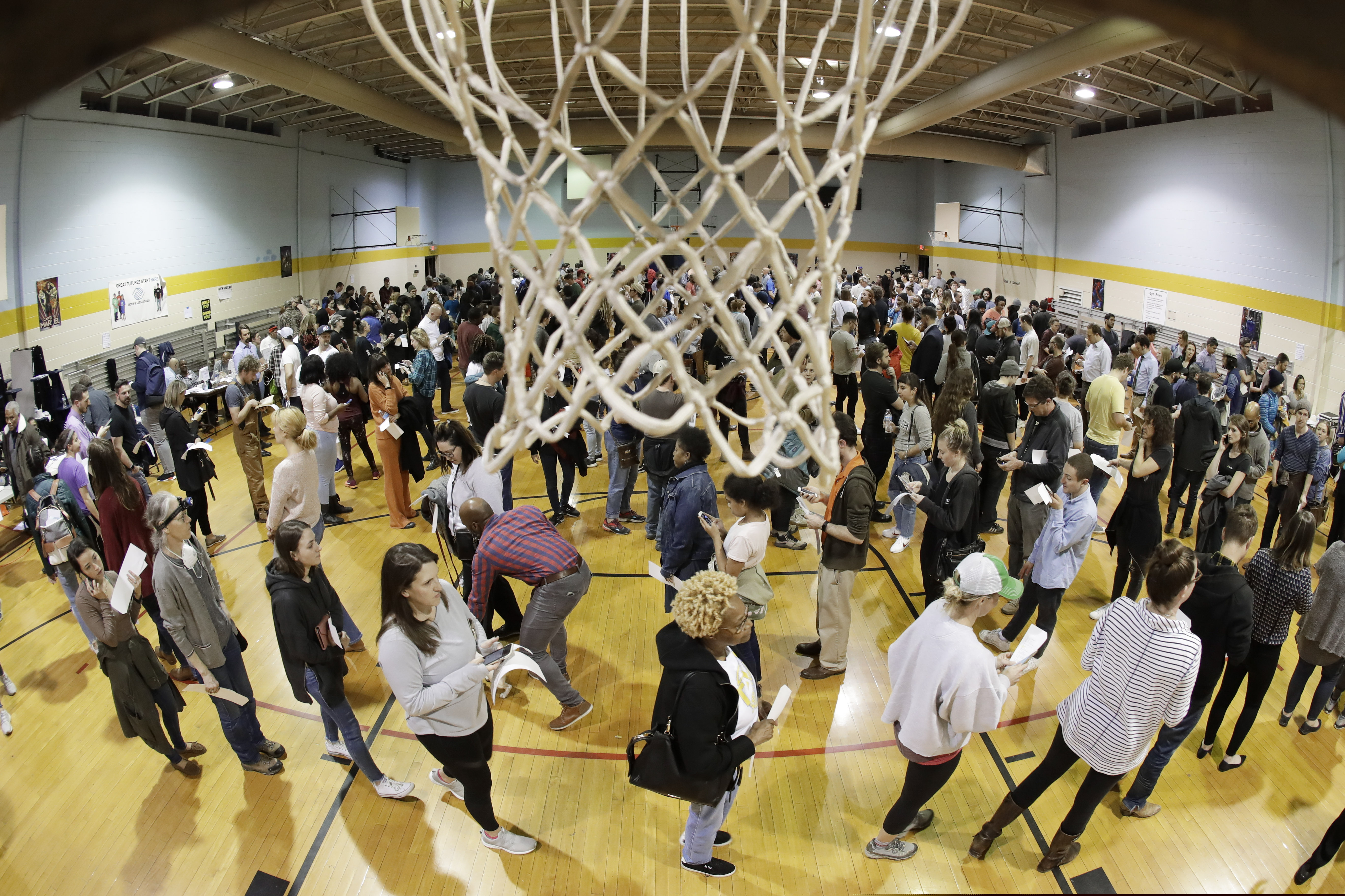 (Mark Humphrey | AP photo)

People wait to vote on Super Tuesday in the gymnasium at Cleveland Park Community Center, Tuesday, March 3, 2020, in Nashville, Tenn.