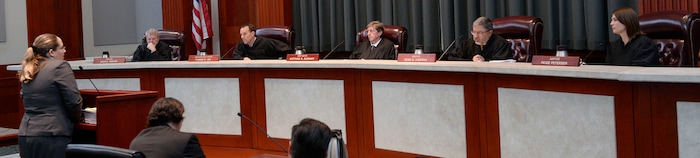 (Al Hartmann  |  The Salt Lake Tribune) 	
Federal public defender Charlotte Merrill, left, argues before the Utah Supreme Court Wednesday Jan. 10. 	
The court heard arguments regarding Anthony Michael Archuleta, 55, who has been on death row since his conviction in 1989 for the Nov. 21, 1988, torture slaying of Gordon Ray Church, a 28-year-old Southern Utah State College theater student, at a remote location in Millard County. In separate trials, Archuleta and co-defendant Lance Conway Wood each were convicted of capital murder. Wood was sentenced to life in prison. Archuleta was sentenced to death. 