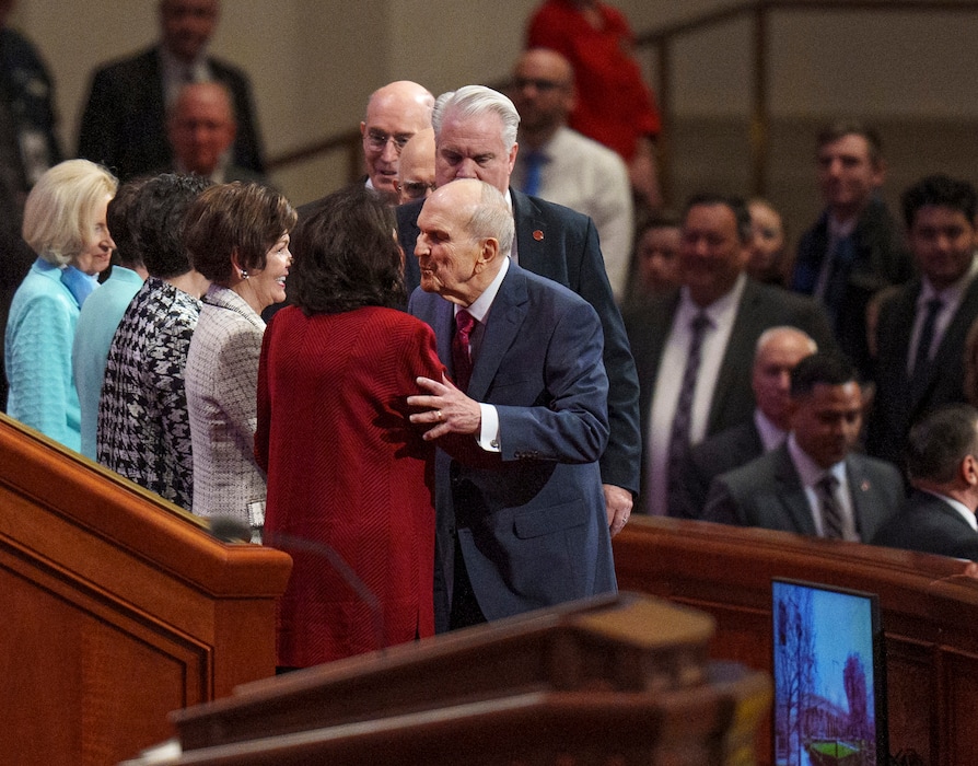 (Leah Hogsten | The Salt Lake Tribune) Russell M. Nelson, 98, stops briefly to kiss his wife, Wendy, before the morning session of General Conference on Saturday, April 1, 2023. Nelson is the oldest prophet-president in the The Church of Jesus Christ of Latter-day Saints' 193-year history.