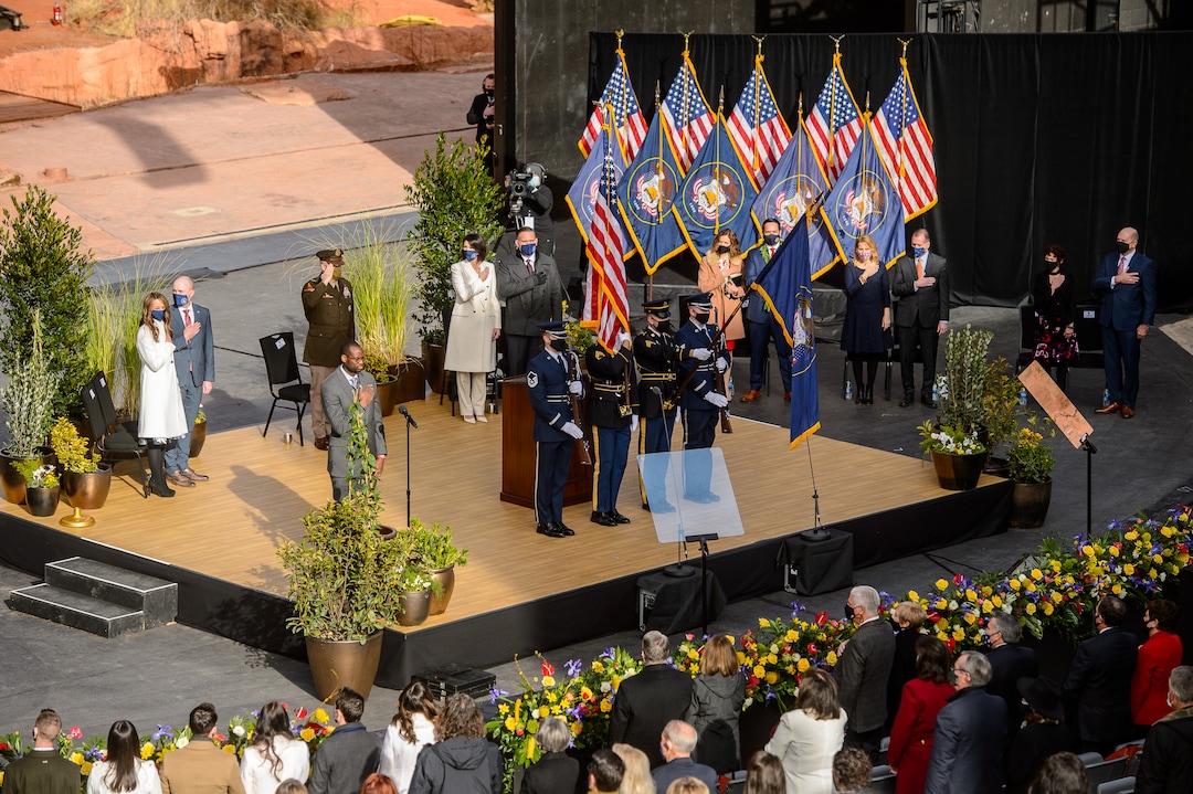 (Trent Nelson  |  The Salt Lake Tribune) Attendees stand for the National Anthem as Spencer Cox is inaugurated as Utah's 18th governor at Tuacahn Center for the Arts in Ivins on Monday, Jan. 4, 2021.