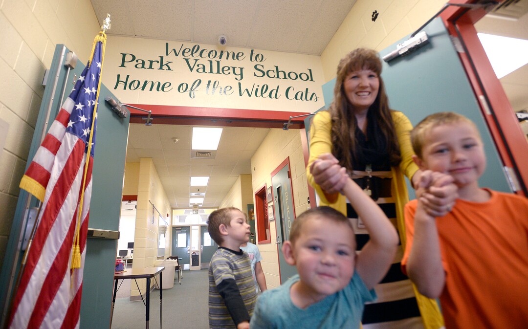 (Al Hartmann  |  The Salt Lake Tribune)  Park Valley School head teacher Melissa Morris leads her kindergarten through second graders on an exploration of the school Wednesday August 30.