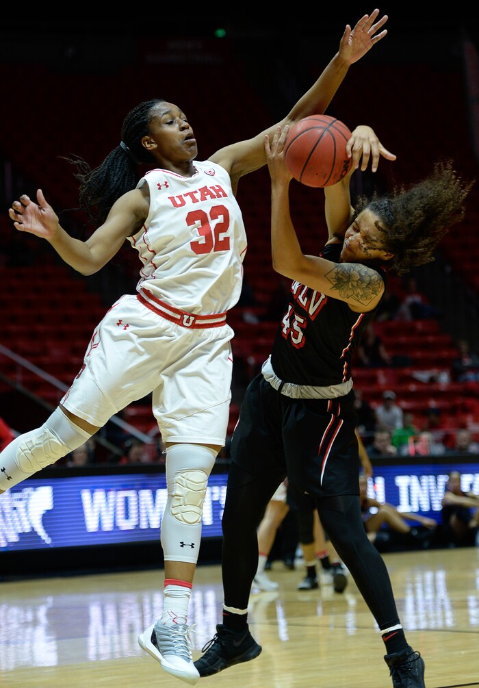 (Francisco Kjolseth  |  The Salt Lake Tribune)  Utah Utes forward Tanaeya Boclair (32) post the pressure on Simone Sheppard as Utah hosts UNLV in women's NCAA basketball at the Huntsman Center, Thursday, March 15, 2018.