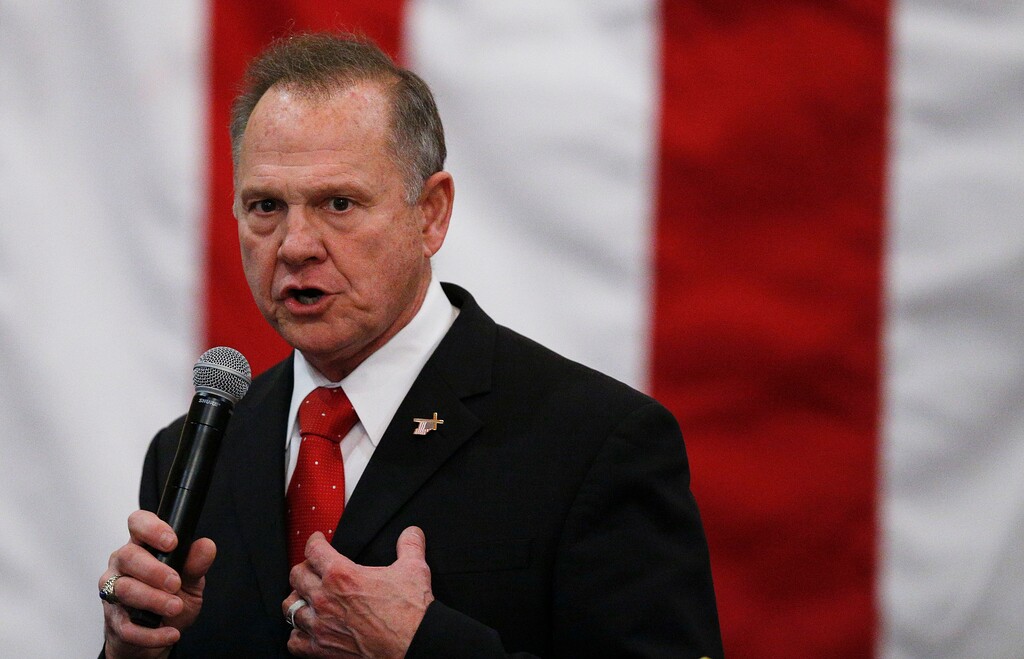 FILE- In this Dec. 11, 2017, file photo, U.S. Senate candidate Roy Moore speaks at a campaign rally in Midland City, Ala. Moore is going to court to try to stop Alabama from certifying Democrat Doug Jones as the winner of the U.S. Senate race. Moore filed a lawsuit Wednesday evening, Dec. 27, 2017, in Montgomery Circuit Court. (AP Photo/Brynn Anderson, File)