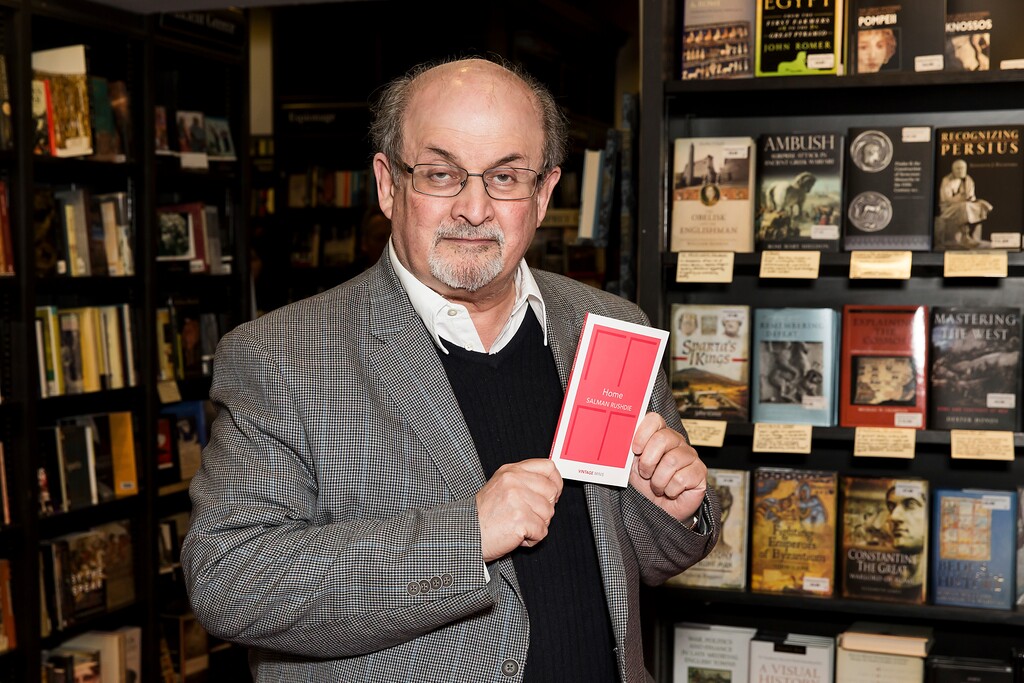 (Photo by Grant Pollard/Invision/AP)

In this June 6, 2017, photo, author Salman Rushdie poses for photographers at a signing for his new book 'Home', in London.