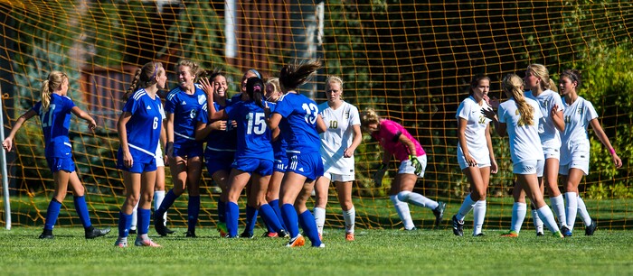 (Chris Detrick | The Salt Lake Tribune) Members of the Fremont soccer team celebrate after scoring a goal on Davis during the game at Angel Street Soccer Complex in Kaysville Thursday, August 24, 2017. Fremont defeated Davis 5-4 in double overtime.