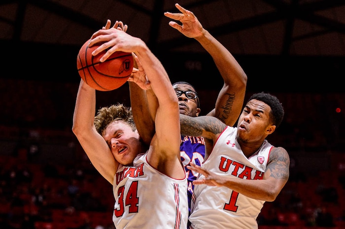 (Trent Nelson | The Salt Lake Tribune)  Utah Utes forward Jayce Johnson (34), Northwestern State Demons forward Ishmael Lane (20) and Utah Utes guard Justin Bibbins (1) collide as the University of Utah hosts Northwestern State, NCAA basketball in Salt Lake City, Wednesday December 20, 2017.