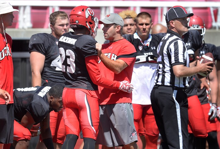 Scott Sommerdorf   |  The Salt Lake Tribune  
Utah Defensive Coordinator / Safeties, Morgan Scalley, pulls aside DB Julian Blackmon to congratulate him on his play during practice, Thursday, August 11, 2016. 
