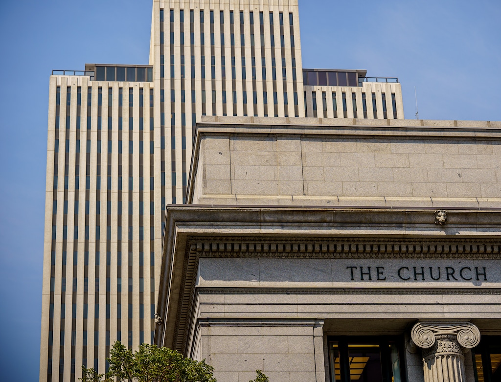 (Trent Nelson | The Salt Lake Tribune) The Church Office Building, rear, towers over the faith's Administration Building in Salt Lake City in 2021. Lawyers for The Church of Jesus Christ of Latter-day Saints are asking a federal judge to toss out would-be class-action case over tithing, arguing that it violates the First Amendment.