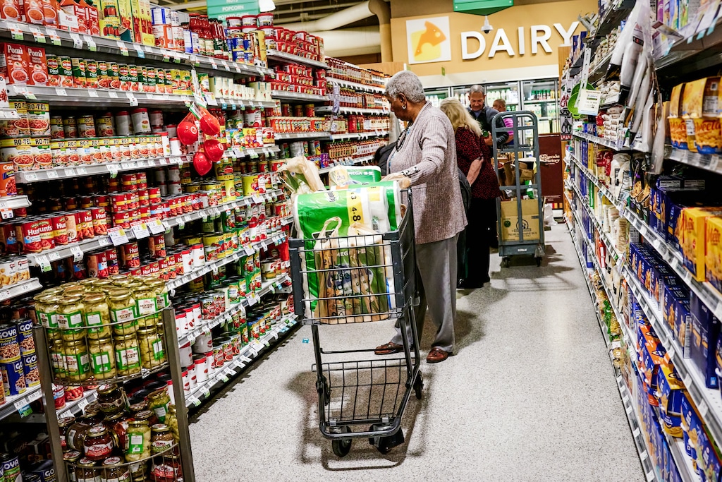 FILE Shoppers at a Publix grocery in Miami Beach on Feb. 21, 2024. President Joe Biden took aim at "shrinkflation" in his State of the Union address, chastising companies for reducing the size of their products without reducing prices. (Scott McIntyre/The New York Times)