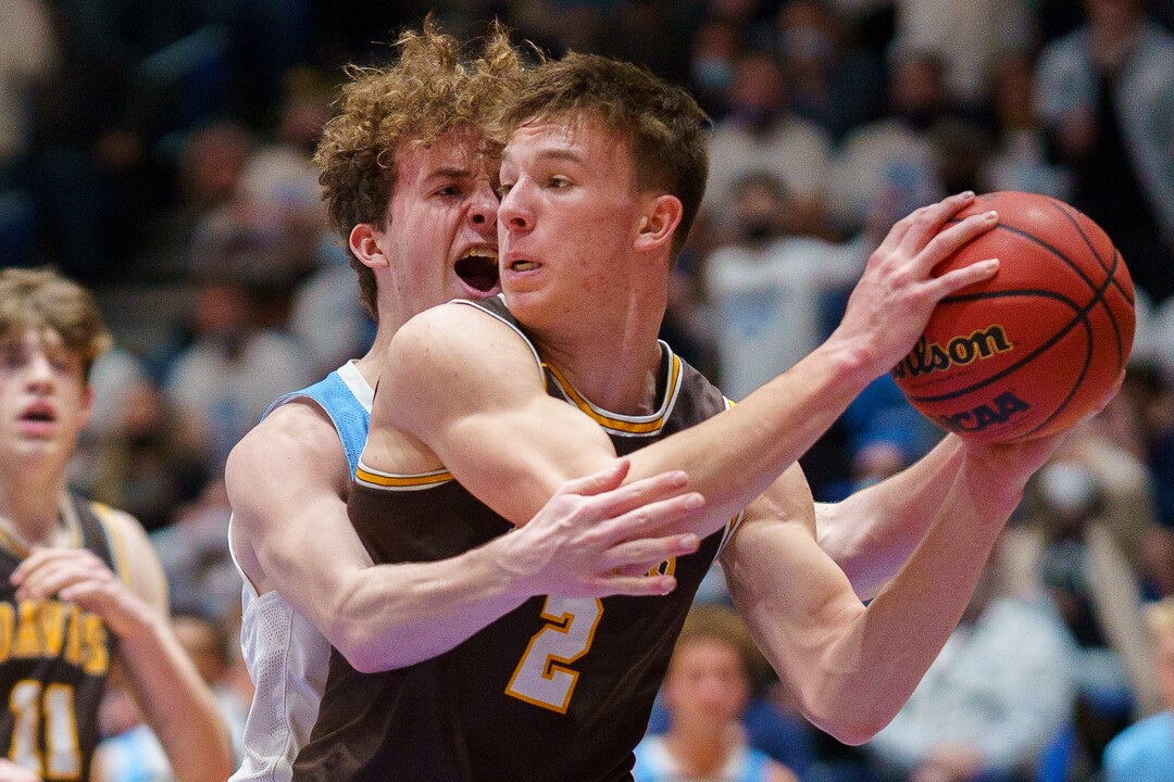 (Trent Nelson  |  The Salt Lake Tribune) Westlake's Kaden Hoppins defending Davis's Chance Trujillo as Davis defeats Westlake High School in the 6A boys basketball state championship game, in Taylorsville on Saturday, March 6, 2021.