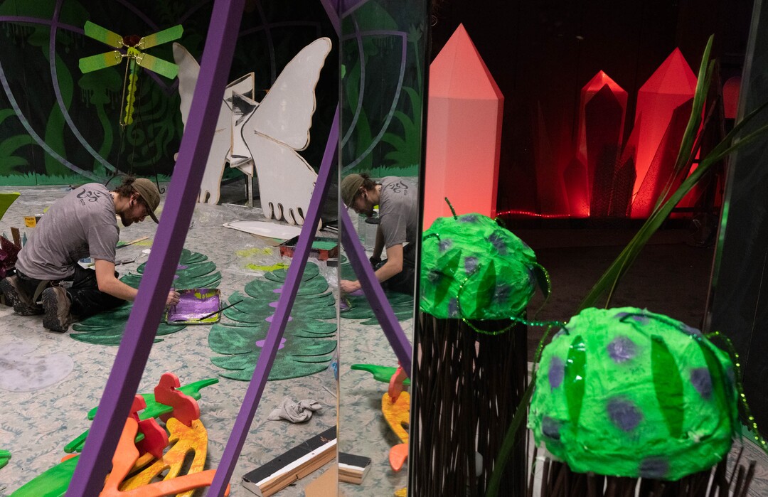 s(Francisco Kjolseth | The Salt Lake Tribune) Artist Ash Amos paints portions of the alien forrest section of Dreamscapes, an immersive experience transformed by artists that promotes sustainability and uses almost exclusively up cycling materials, begins to take shape in the old Macy's at South Town on Wednesday, April 20, 2022. 