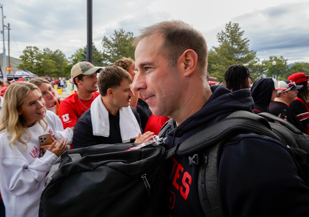 (Chris Samuels | The Salt Lake Tribune) Utah defensive coordinator Morgan Scalley walks to Rice-Eccles Stadium before Utah plays Texas Tech on Sept. 20, 2025.