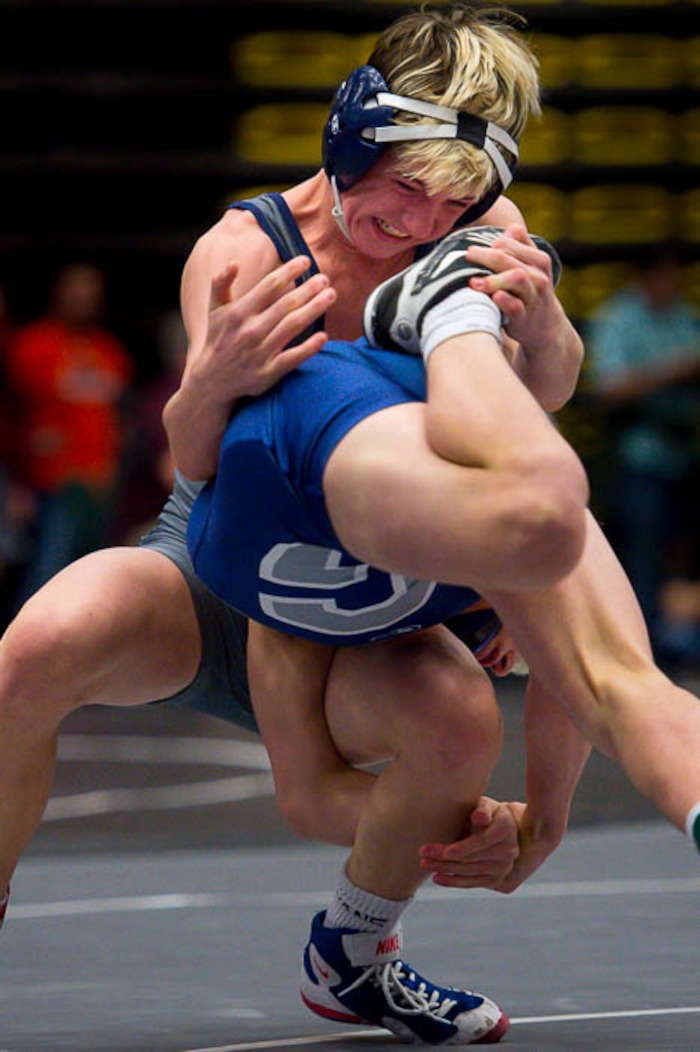 (Trent Nelson | The Salt Lake Tribune)  Pleasant Grove's Oakley Ridge and Layton's Jaron Priest (top), 6A State Championships, high school wrestling quarterfinals in Orem, Wednesday February 7, 2018.