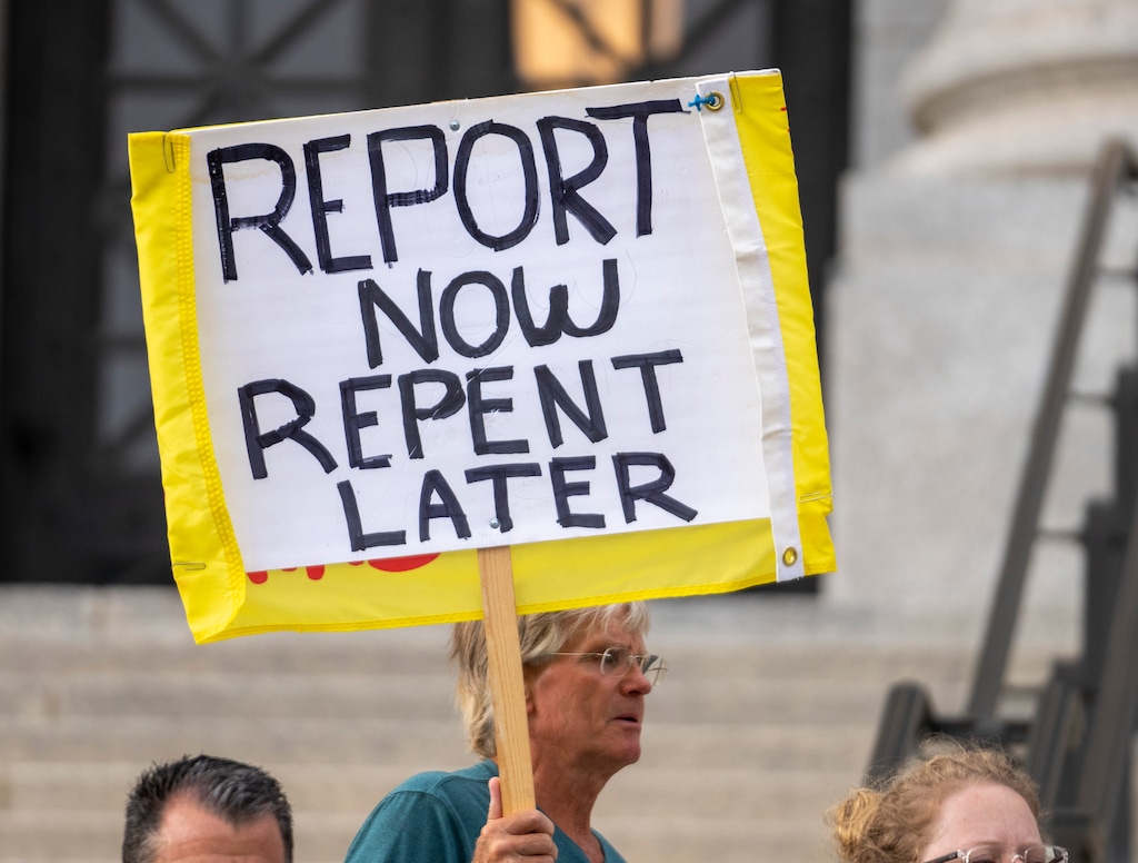 (Rick Egan | The Salt Lake Tribune)  Protesters gather on the steps of the Utah Capitol in 2022 for a rally to gain support for removing the clergy exemption from mandatory reporting in cases of abuse and neglect, on Friday, Aug. 19, 2022. A 2024 bill awaiting the governor's signature is designed to shield clergy who report ongoing abuse of minors from legal fallout.
