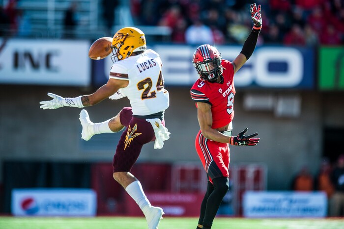 (Chris Detrick  |  The Salt Lake Tribune)  Arizona State Sun Devils defensive back Chase Lucas (24) intercepts the ball intended for Utah Utes wide receiver Darren Carrington II (9) during the game at Rice-Eccles Stadium Saturday, October 21, 2017. 