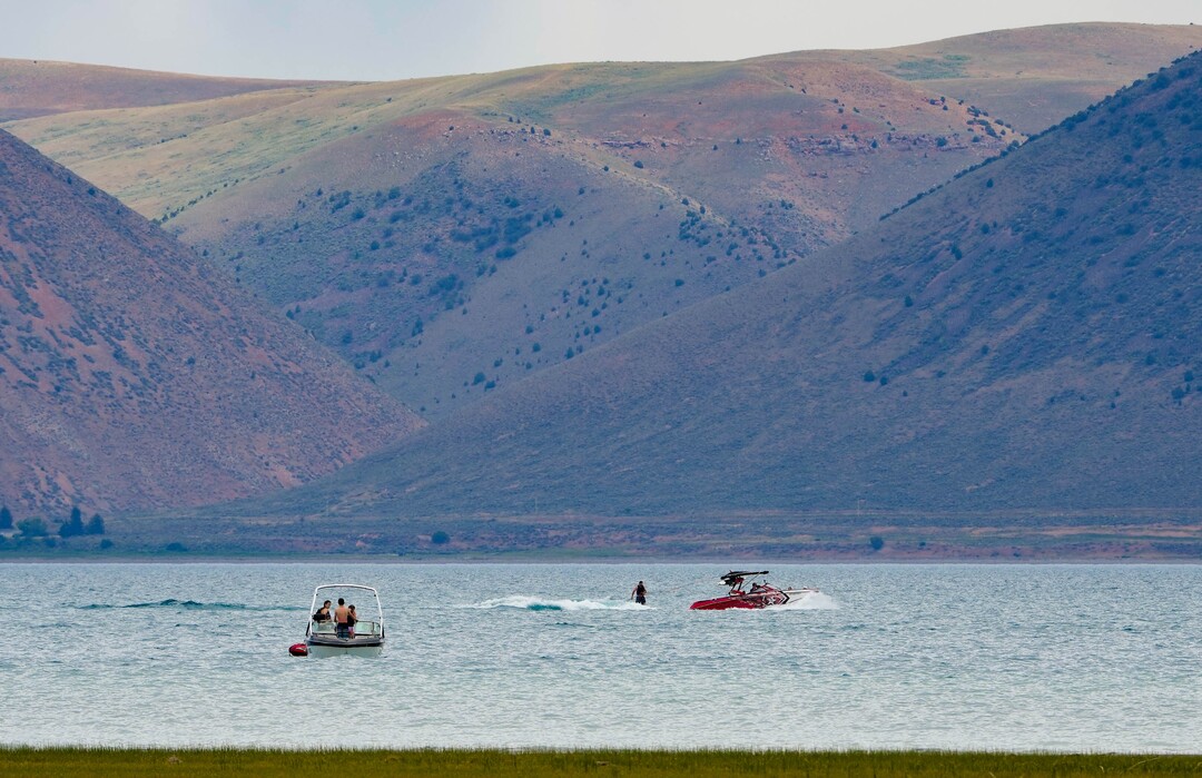 (Francisco Kjolseth | The Salt Lake Tribune) People recreate in the clear blue waters of Bear Lake on Thursday, June 30, 2022. A new study is out showing the economic contributions of Bear Lake, underscoring the need to keep the lake healthy.