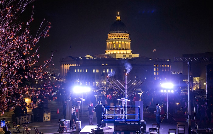 (Rick Egan | The Salt Lake Tribune) Rabbi Benny Zippel gather for lighting of Utah's tallest menorah, 20 feet high, at the Utah Capitol for the first night of Hanukkah on Thursday, Dec. 10, 2020.