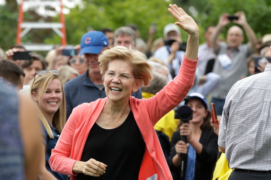 Democratic presidential candidate Sen. Elizabeth Warren, D-Mass., waves as she arrives to a campaign event, Monday, Sept. 2, 2019, in Hampton Falls, N.H. (AP Photo/Elise Amendola)